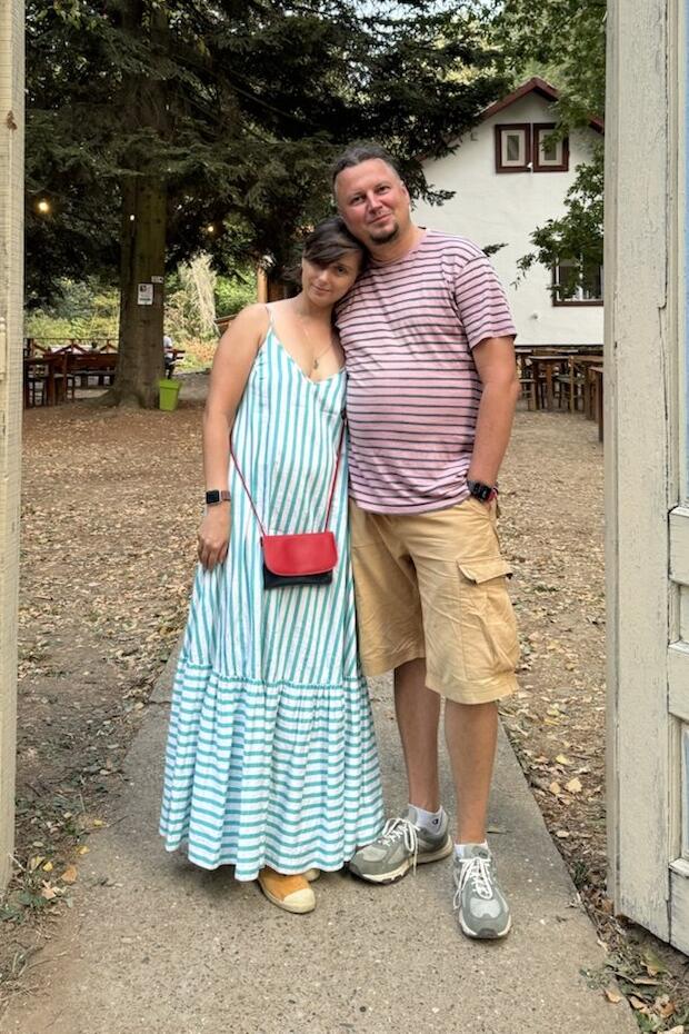 Alina and Pavel Riaby, the founders of Crest, standing together outdoors
